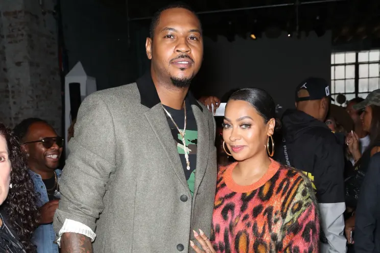 Carmelo Anthony (6'8") and La La Anthony (5'6")