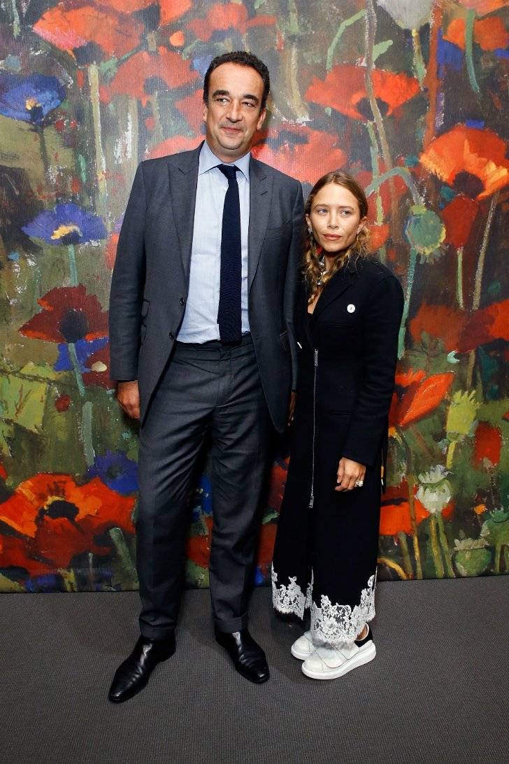 Mary-Kate Olsen (5'2") and Olivier Sarkozy (6'3")