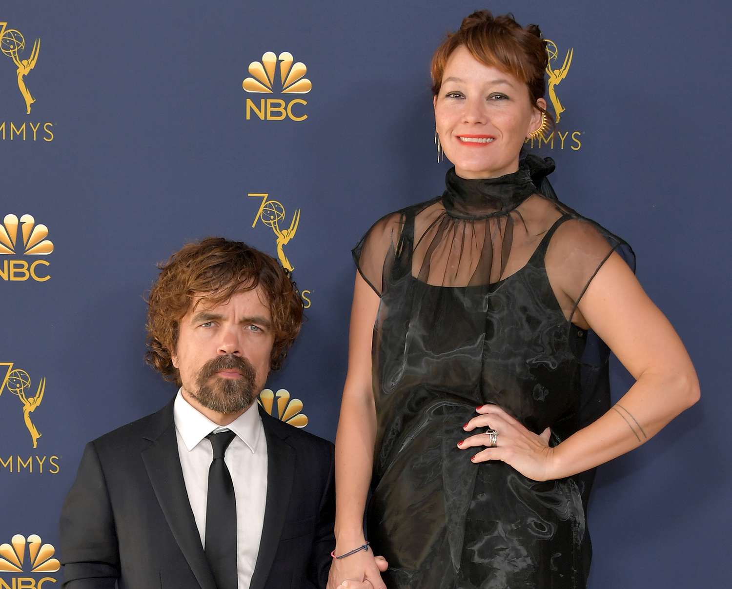 Peter Dinklage (4'5") and Erica Schmidt (5'6")