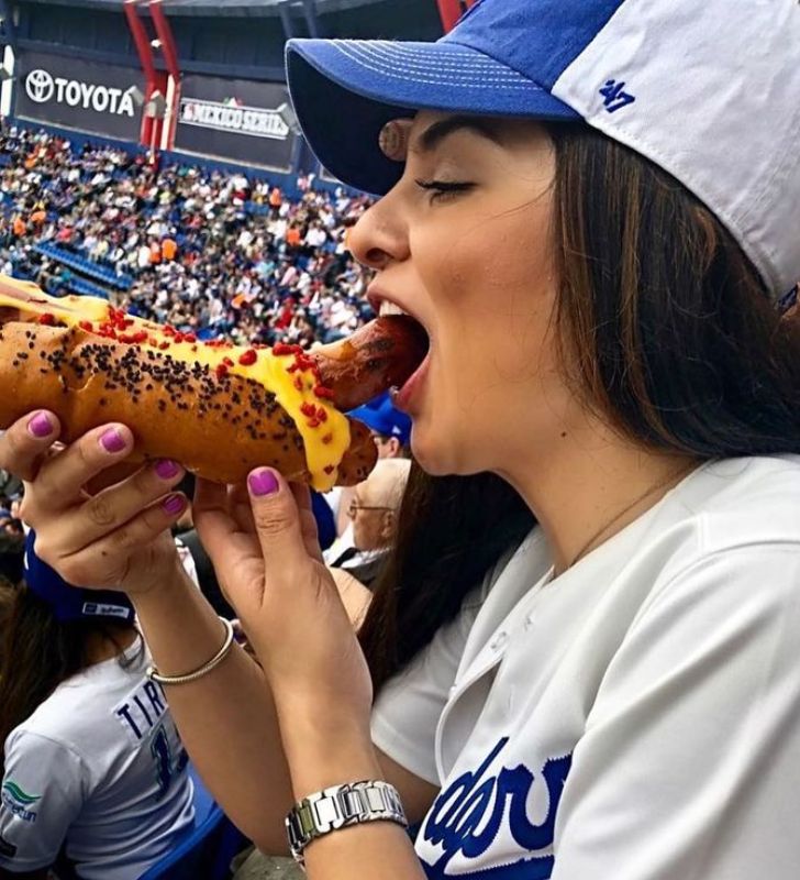 Cheese Cascade Champion: Fan’s Epic Hotdog Moment Steals the Spotlight