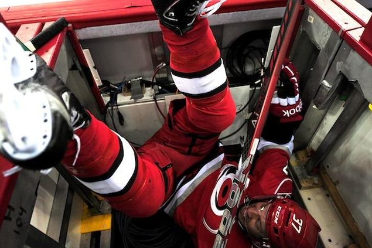 Tim Brent Takes Flight Flipping Over Boards in Epic Hockey Check